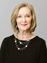 Marie Swift standing 3-4 Photo with Stool Crop 1000pxW (4)